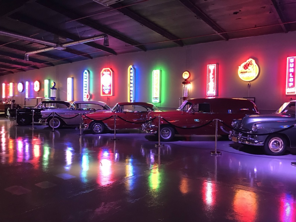 Classic cars and neon signs at Highway 39 Event Center